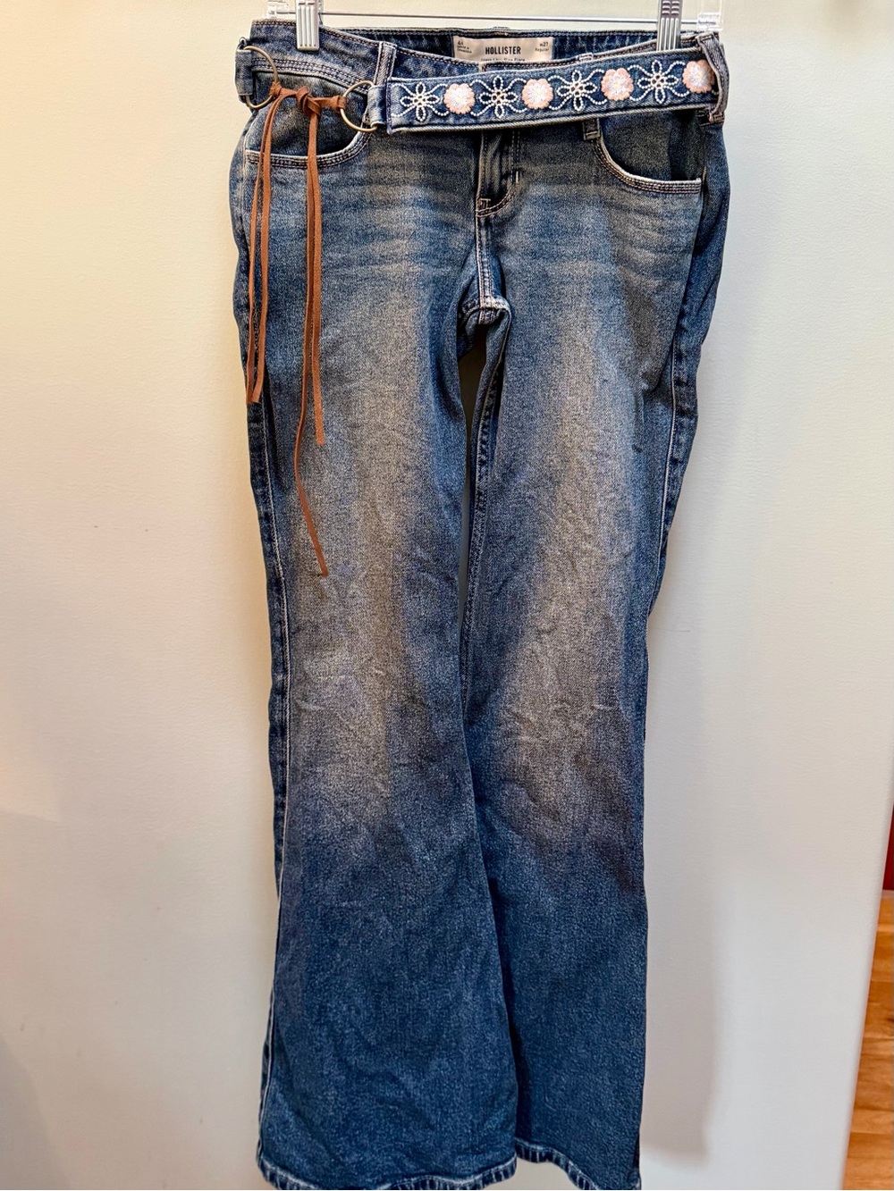 Hollister ultra low rise flared blue jeans with embroidered belt W 27 inseam 30”